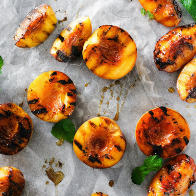 Garam Masala Grilled Peaches with Saffron Whipped Cream